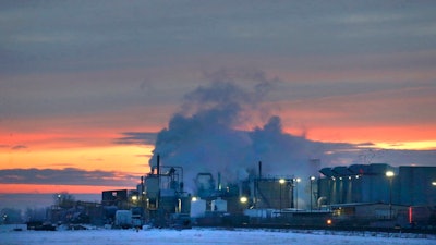 In this Jan. 11, 2016 file photo, dawn approaches over the meat processing plant owned and run by Cargill Meat Solutions, in Fort Morgan, a small town on the eastern plains of Colorado. The U.S. Department of Agriculture announced Wednesday, Sept. 20, 2018, that the company has recalled more than 132,000 pounds of ground beef after a deadly E. coli outbreak. The beef was produced on June 21 and shipped to retailers nationwide under several brands.