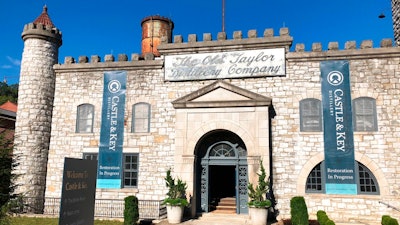 This Friday, Sept. 14, 2018 photo, shows the exterior of the Old Taylor distillery’s towering limestone castle which underwent a massive rehabilitation after decades of neglect and was renamed Castle & Key Distillery, in Millville, Ky. Four years after purchasing the property, owners Will Arvin and Wes Murry have poured millions into the project and resumed spirits production. On Wednesday, Sept. 19, the pair reopens the grounds to visitors.