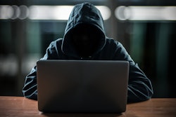 Hacker In Front Of His Computer 583818378 2142x1404