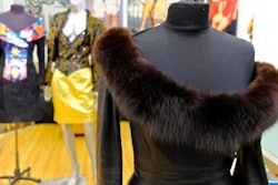 This March 15, 2018, file photo shows a vintage fox trimmed leather dress displayed in the basement of a store in San Francisco. Los Angeles would become the largest city in the U.S. to ban the sale of fur products if the City Council approves a proposed law backed by animal activists who say the multibillion-dollar fur industry is rife with cruelty.