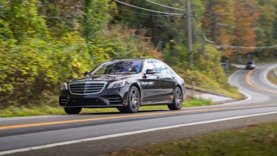 This undated photo provided by Mercedes-Benz, shows the 2018 Mercedes-Benz S 450 sedan. In a few of its vehicles, such as S-Class models, Mercedes-Benz has a similar 'partial driving automation system,' to use the latest definition from the Society of Automotive Engineers.