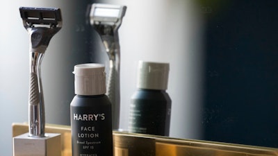 In this June 15, 2018, photo, the Winston razor and Harry's face lotion are on display at the headquarters of Harry's Inc., in New York. Armed with $112 million in new financing, the online startup that took on razor giants Gillette and Schick with its direct-to-consumer subscription model is investigating what other sleepy products might be ripe for disruption.