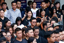 Plaintiffs of Ford cars with bad transmissions gather outside civil court after a verdict in a class-action lawsuit in Bangkok, Thailand, Friday, Sept. 21, 2018. The Thai court has ordered Ford Motor Co. to pay 291 customers a total of around $720,000 in compensation for selling cars equipped with faulty transmissions.