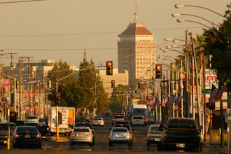 In this June 23, 2017 file photo, cars and trucks roll along a section of Blackstone Avenue during rush hour in Fresno, Calif. Doctors and California officials will be among those weighing in on the Trump administration's proposal to roll back car-mileage standards at a hearing in a region with some of the nation's worst air pollution. The day-long session in Fresno on Monday, Sept. 24, 2018, is the first of three events by the U.S. Environmental Protection Agency and National Highway Traffic Safety Administration to gather public comment on the mileage plan.