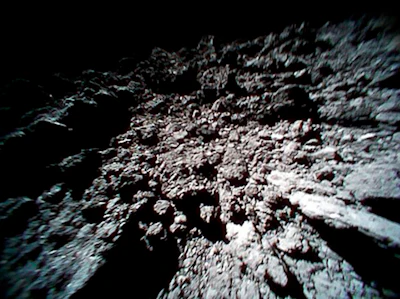 This Sept. 23, 2018 image captured by Rover-1B, and provided by the Japan Aerospace Exploration Agency (JAXA) shows the surface of asteroid Ryugu.