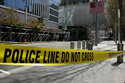 Police tape blocks off Fremont Street outside the closed Salesforce Transit Center Wednesday, Sept. 26, 2018, in San Francisco. A second beam in San Francisco's celebrated new $2 billion transit terminal shows signs of cracking, an official said Wednesday, a day after a crack in a nearby support beam shut down the building that opened just last month. The first crack found by workers installing roof tiles Tuesday spans a beam holding up a park over the three-block-long facility and runs over a downtown street, Salesforce Transit Center executive director Mark Zabaneh said.