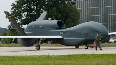 In this Thursday, July 21, 2011 photo a recce drone 'Euro Hawk' is moved at the air base in Manching, Germany. Germany wants to sell a second-hand drone that’s cost the country over 700 million euros ($823 million) to Canada, without many core components it needs to fly.
