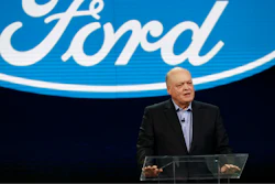 In this Jan. 14, 2018, file photo Ford President and CEO Jim Hackett prepares to address the media at the North American International Auto Show in Detroit. Hackett said Wednesday, Sept. 16, during a television interview that the Trump administration's tariffs on imported steel and aluminum will cost the company $1 billion.