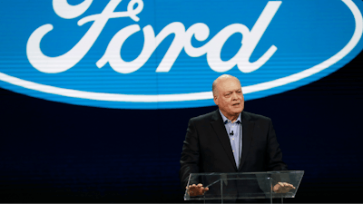 In this Jan. 14, 2018, file photo Ford President and CEO Jim Hackett prepares to address the media at the North American International Auto Show in Detroit. Hackett said Wednesday, Sept. 16, during a television interview that the Trump administration's tariffs on imported steel and aluminum will cost the company $1 billion.