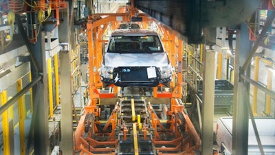 In this Feb. 10, 2015, file photo, the Observation Deck Tour gives visitors a chance to watch the Ford F-150 pick-up being produced at the Ford Rouge Factory in Dearborn, Mich. Ford is celebrating a century of production at its storied Rouge factory. The company is expected to make an announcement about the plant’s future at a ceremony Thursday, Sept. 27, 2018.