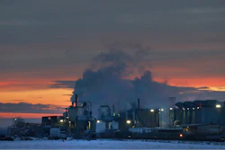 In this Jan. 11, 2016 file photo, dawn approaches over the meat processing plant owned and run by Cargill Meat Solutions, in Fort Morgan, a small town on the eastern plains of Colorado. The U.S. Equal Employment Commission said Friday, Sept. 14, 2018 that Cargill has agreed to pay $1.5 million to 138 Somali-American Muslim workers who were fired from the plant in 2016 after they were refused prayer breaks.