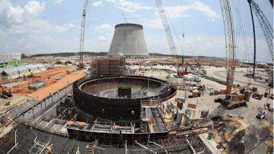 This June 13, 2014, file photo, shows construction on a new nuclear reactor at Plant Vogtle power plant in Waynesboro, Ga. A group of Georgia lawmakers wants a “cost cap” in the construction of a nuclear power plant near Augusta to protect blown budgets from being passed on to consumers. Two reactors being built at Plant Vogtle are billions of dollars over budget.