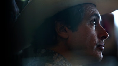 In this May 8, 2018, file photo, investor and entrepreneur Kimbal Musk listens to billionaire investor Steve Case as he speaks during the Rise of the Rest bus tour at Musk's restaurant, The Kitchen, at Shelby Farms Park in Memphis, Tenn. Musk, who serves on the board of brother Elon Musk’s companies Tesla and SpaceX, spoke at a Yahoo! Finance breakfast Monday, Sept. 17, about the promise of urban farming and his mission to bring local, trustworthy food and restaurants and gardens to schoolchildren around the country.