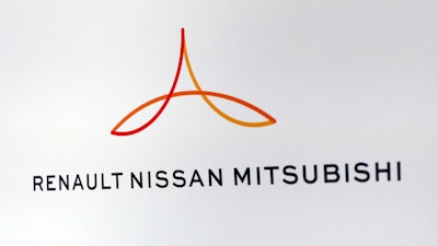 This Friday Sept. 15, 2017 file photo shows the new logo of the Renault-Nissan-Mitsubishi alliance during a press conference in Paris, France. Renault-Nissan-Mitsubishi said Tuesday Sept. 18, 2018 that Google is teaming up with Renault-Nissan-Mitsubishi to add the search giant’s Android mobile operating system to the auto alliance’s dashboard media systems.