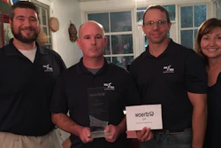From left to right: Mike Urenovich Jr, Kevin McSorley, Nick Vassallo, and Debbie Vassallo of Electrotech Sales Group receive a top export distributor award for 2016-2017.