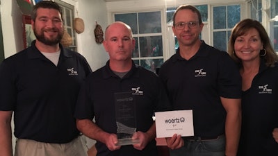 From left to right: Mike Urenovich Jr, Kevin McSorley, Nick Vassallo, and Debbie Vassallo of Electrotech Sales Group receive a top export distributor award for 2016-2017.