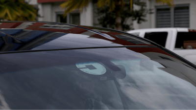 In this June 6, 2018, file photo Uber driver Joshua Oh drives in Honolulu. Uber has created a feature on its app to reach out to passengers and drivers if it detects an accident or unplanned stop. Drivers will also have access to a hands-free feature to pick up passengers without touching their phones, and they will no longer see data detailing where they retrieved passengers in the past.