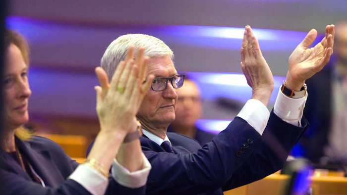 Apple CEO Tim Cook applauds during a data privacy conference at the European Parliament in Brussels, Wednesday, Oct. 24, 2018.