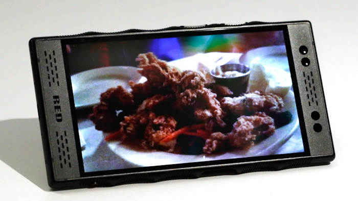 This Friday, Oct. 26, 2018, photo shows the Red Hydrogen One smartphone in New York. The new Hydrogen One has a holographic screen that produces 3-D visuals without needing special glasses. It is launching with two major movies converted to this format and allows users to create and share their own videos shot with the phone.