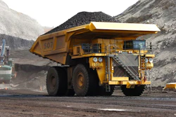 In this April 4, 2013, file photo, a mining dumper truck hauls coal at Cloud Peak Energy's Spring Creek strip mine near Decker, Mont. The Trump administration is considering using West Coast military bases or other federal properties as transit points for shipments of U.S. coal and natural gas to Asia.
