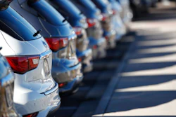 In this Oct. 21, 2018, photo a long line of unsold 2018 QX60 sports utility vehicles cast long shadows at an Infiniti dealership in Highlands Ranch, Colo. On Monday, Oct. 29, the Commerce Department issues its September report on consumer spending, which accounts for roughly 70 percent of U.S. economic activity.