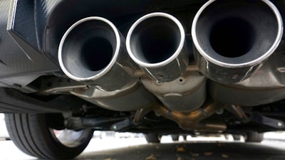 Exhaust pipes of a car are pictured in Berlin, Germany, Tuesday, Oct. 9, 2018. Due to environment protection reasons the city of Berlin has to introduce a diesel driving ban on several highly frequented roads.