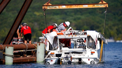 In this July 23, 2018 file photo, the duck boat that sank in Table Rock Lake in Branson, Mo. Ripley Entertainment, the company that owns the Ride the Ducks operation in Branson asked a judge Monday, Oct. 1, 2018, to dismiss some of the lawsuits filed after one of its boats sank in a Missouri lake in July, killing 17 people. Survivors and relatives of those who died on the boat have filed several lawsuits against Ripley Entertainment and five other businesses.