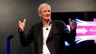 In this Wednesday, Sept., 14, 2011 file photo, Inventor James Dyson launches the Dyson DC41 Ball vacuum and the Dyson Hot heater fan on in New York. Dyson, the British company best known for innovative vacuum cleaners, has said on Tuesday, Oct. 23, 2018 it will build its electric car in Singapore. The company says the bespoke manufacturing facility is due for completion in 2020 and is part of a 2.5 billion pound ($3.2 billion) investment in new technology globally.
