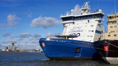 In this photo taken taken Thursday Sept. 27, 2018, the Finnish icebreaker Polaris is moored in Helsinki after an oil spill response drill testing an in-built recovery system, a first for an icebreaker. The vessel can collect 1,400 cubic meters (49,000 cubic feet) of oil, even in harsh and icy weather conditions.