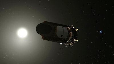 This illustration made available by NASA shows the Kepler Space Telescope. As of October 2018, the planet-hunting spacecraft has been in space for nearly a decade.
