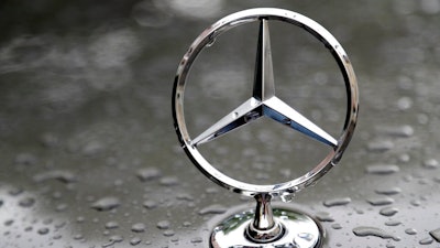 A July 28, 2017 file photo shows the logo of German car manufacturer Mercedes-Benz in Munich, Germany. The U.S. government is investigating German automaker Mercedes-Benz, alleging that is has been slow to mail safety recall notices and file required reports involving recalls of over 1.4 million vehicles. Mercedes says in a statement issued Saturday, Oct. 27, 2018 that it makes every effort to ensure recall campaigns and customer notifications are done in a timely manner.