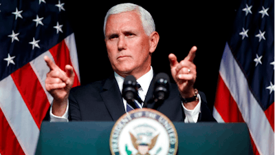 In this Aug. 9, 2018 file photo, Vice President Mike Pence gestures during an event on the creation of a U. S. Space Force at the Pentagon. With his demand that the Pentagon create a new military service -- a Space Force to assure “American dominance in space” -- President Donald Trump has injected urgency into a long-meandering debate over the best way to protect U.S. interests in space, both military and commercial.