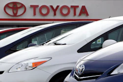 This Feb. 19, 2012, file photo shows a line of 2012 Prius sedans at a Toyota dealership in the south Denver suburb of Littleton, Colo. Toyota Motor Corp. said Friday, Oct. 5, 2018, it has issued a recall for 2.43 million hybrid vehicles in Japan and elsewhere for problems with stalling.
