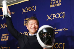 Zozo Chief Executive Yusaku Maezawa poses for the media prior to his news conference in Tokyo, Tuesday, Oct. 9, 2018. The Japanese online retail tycoon who plans to travel to the moon on the SpaceX rocket says he respects and trusts Elon Musk as a fellow entrepreneur, despite his recent troubles.