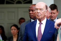 In this Wednesday, July 25, 2018 file photo, Commerce Secretary Wilbur Ross stands in the Rose Garden of the White House, in Washington. U.S. Secretary of Commerce Wilbur Ross is criticizing the EU for moving too slowly in trade talks. “We really need tangible progress. The president’s patience is not unlimited,” Ross told reporters in Brussels, a day after talks with EU Trade Commissioner Cecilia Malmstrom on Tuesday, Oct. 16.