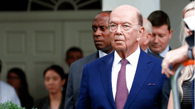 In this Wednesday, July 25, 2018 file photo, Commerce Secretary Wilbur Ross stands in the Rose Garden of the White House, in Washington. U.S. Secretary of Commerce Wilbur Ross is criticizing the EU for moving too slowly in trade talks. “We really need tangible progress. The president’s patience is not unlimited,” Ross told reporters in Brussels, a day after talks with EU Trade Commissioner Cecilia Malmstrom on Tuesday, Oct. 16.