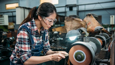 Female Worker Holding Components Metal Grinding 835676872 7360x4912 (1)