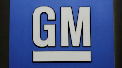 This Jan. 25, 2010, file photo, shows a General Motors Co. logo during a news conference in Detroit. General Motors says it will ask the federal government for one national gas mileage standard, including a requirement that a percentage of auto companies’ sales be zero-emissions vehicles. Mark Reuss, GM’s executive vice president of product development, said the company will propose that a certain percentage of nationwide sales be made up of vehicles that run on electricity or hydrogen fuel cells.