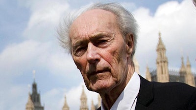 In this Thursday, April 25, 2013 file photo, Norwegian war hero and resistance fighter Joachim Roenneberg holds a Union flag as he walks in a park near the Palace of Westminster, after receiving the Union Jack Medal for his efforts and cooperation with the British during the second World War. Norway's leader says World War II saboteur Roenneberg has died at 99, it was reported on Monday, Oct. 22, 2018. In 1943, Roenneberg headed the four-man team that blew up a plant producing heavy water, which Nazi Germany could have used to produce nuclear weapons.