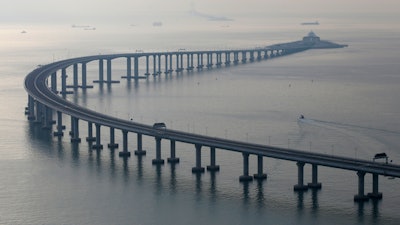 The Hong Kong-Zhuhai-Macau Bridge is seen in Hong Kong, Monday, Oct. 22, 2018. The bridge, the world's longest cross-sea project, which has a total length of 55 kilometers (34 miles), will have opening ceremony in Zhuhai on Oct. 23.