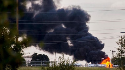 Smoke fills the air as a insulated tank that contains 7000 gallons of heating oil and glycerol burns after catching fire at the OG&E Power plant near NW 10th St. in Oklahoma City, Okla. on Thursday, Oct. 4, 2018.