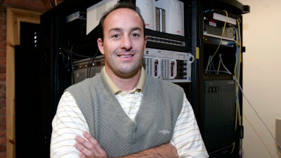 In this Oct. 13, 2005, photo Jeffrey Ansted, founder of American Broadband and Telecommunications, poses for a photo. The Federal Communications Commission accused Toledo-based American Broadband and Telecommunications Co. of creating fake accounts by using the identities of dead people and manipulating the information from existing customers to get government reimbursements. The company's founder, Ansted, used the money to buy country club memberships, a Ferrari convertible, a Florida condominium and an $8 million Cessna jet, the FCC said.