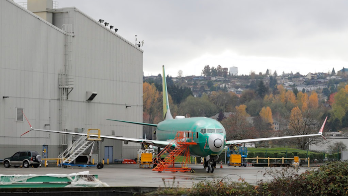 In this Nov. 14, 2018, file photo a Boeing 737-MAX 8 is parked outside Boeing Co.'s 737 assembly facility in Renton, Wash. Southwest Airlines says its pilots will get more instruction on an automated anti-stall system on certain new Boeing jets, and American Airlines pilots are also seeking more training. The system is under scrutiny after a deadly crash in Indonesia. The developments came Thursday, Nov. 29, after Boeing technical experts met separately with pilots from both airlines.