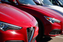 In this Oct. 21, 2018, file photo a long line of unsold 2018 Stelvio sports-utility vehicles sits at an Alfa Romeo dealership in Highlands Ranch, Colo. On Wednesday, Nov. 21, the Commerce Department releases its October report on durable goods.