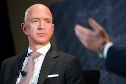 In this Sept. 13, 2018, file photo Jeff Bezos, Amazon founder and CEO, speaks at The Economic Club of Washington's Milestone Celebration in Washington. Amazon expects to begin recruiting next year for software developers, accountant, executives, managers, and human resources professionals for its new hubs in New York’s Long Island City and the Washington suburb of Arlington. The employees will be hired over several years as Amazon seeks talent to support an empire that has expanded beyond retail to include cloud computing services, advertising and, video streaming and TV production.