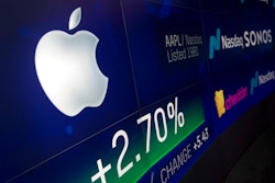 In this Aug. 2, 2018, file photo an electronic screen displays Apple stock at the Nasdaq MarketSite in New York. Apple became the first U.S. company valued at $1 trillion in August.