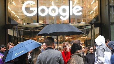 People outside the Google offices in Granary Sqaure, London, Thursday Nov. 1, 2018. Hundreds of Google engineers and other workers walked off the job Thursday morning to protest the internet company’s lenient treatment of executives accused of sexual misconduct. Employees were seen staging walkouts at offices in Tokyo, Singapore, London, and Dublin.