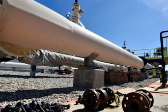 In this June 8, 2017, file photo, fresh nuts, bolts and fittings are ready to be added to the east leg of the pipeline near St. Ignace, Mich., as Enbridge prepares to test the east and west sides of the Line 5 pipeline under the Straits of Mackinac in Mackinaw City, Mich. Gov. Rick Snyder hopes to use the final weeks of his tenure to lock in a deal allowing construction of a hotly debated oil pipeline tunnel beneath a channel linking two of the Great Lakes.