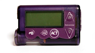 This Nov. 14, 2018 photo taken in Jackson, Miss., shows the Medtronic Paradigm REAL-Time Revel insulin pump of Polly Varnado's daughter. Medical device manufacturers and experts say insulin pumps are safe. But an AP investigation found that insulin pumps and their components are responsible for the highest number of malfunction, injury and death reports in the U.S. Food and Drug Administration’s medical device database.