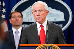 Attorney General Jeff Sessions speaks during a news conference to announce a criminal law enforcement action involving China, at the Department of Justice in Washington, Thursday, Nov. 1, 2018. Standing behind Sessions is Assistant Attorney General for National Security John C. Demers. The Justice Department and FBI leaders announced criminal charges and an operation to thwart Chinese economic espionage.